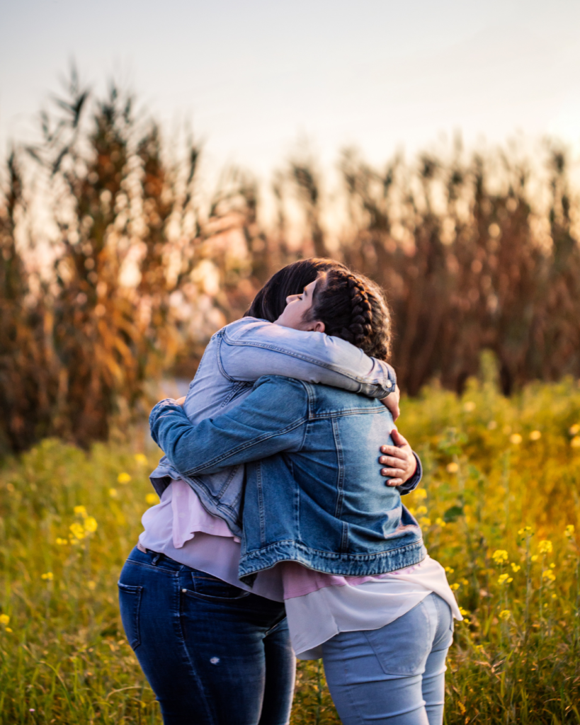 women hugging